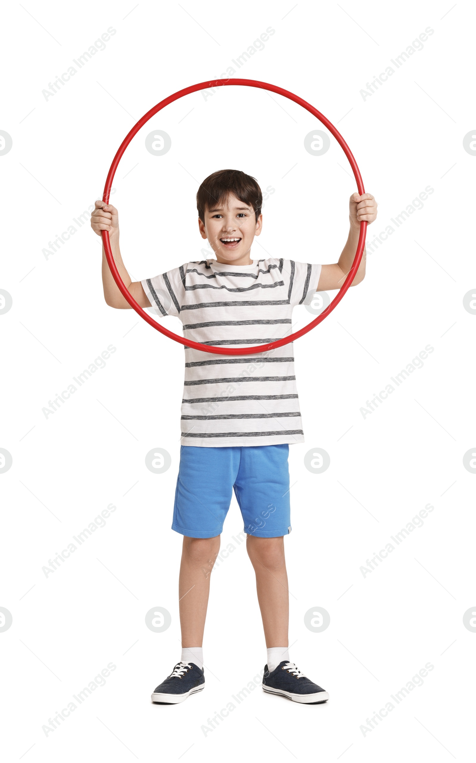 Photo of Smiling boy with hula hoop on white background