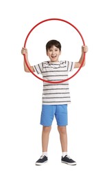 Photo of Smiling boy with hula hoop on white background