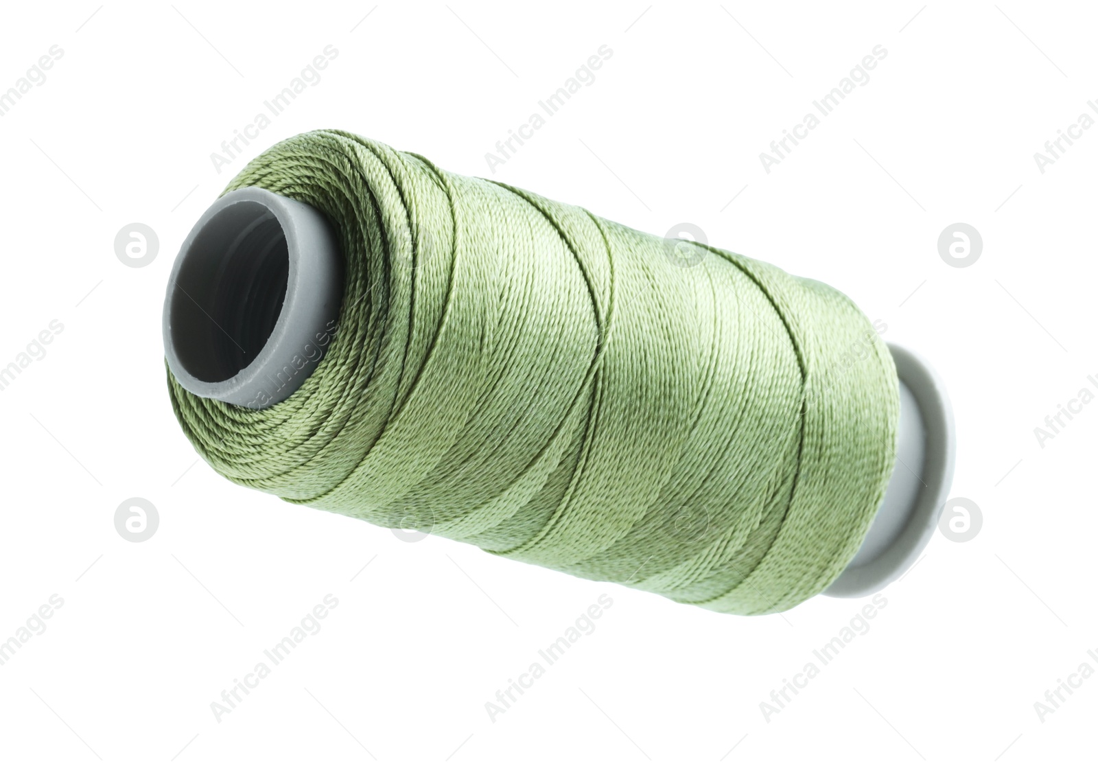 Photo of One spool of sewing thread isolated on white