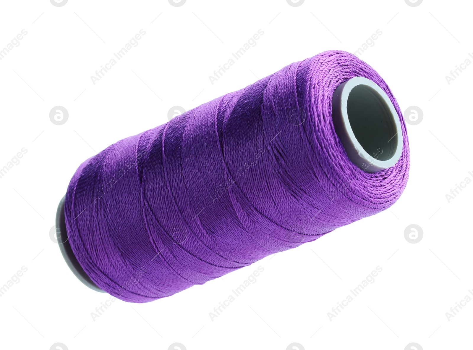 Photo of One spool of sewing thread isolated on white