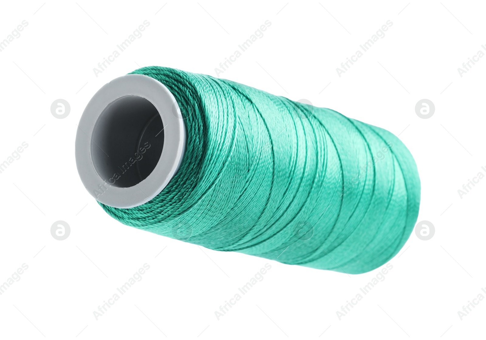 Photo of One spool of sewing thread isolated on white