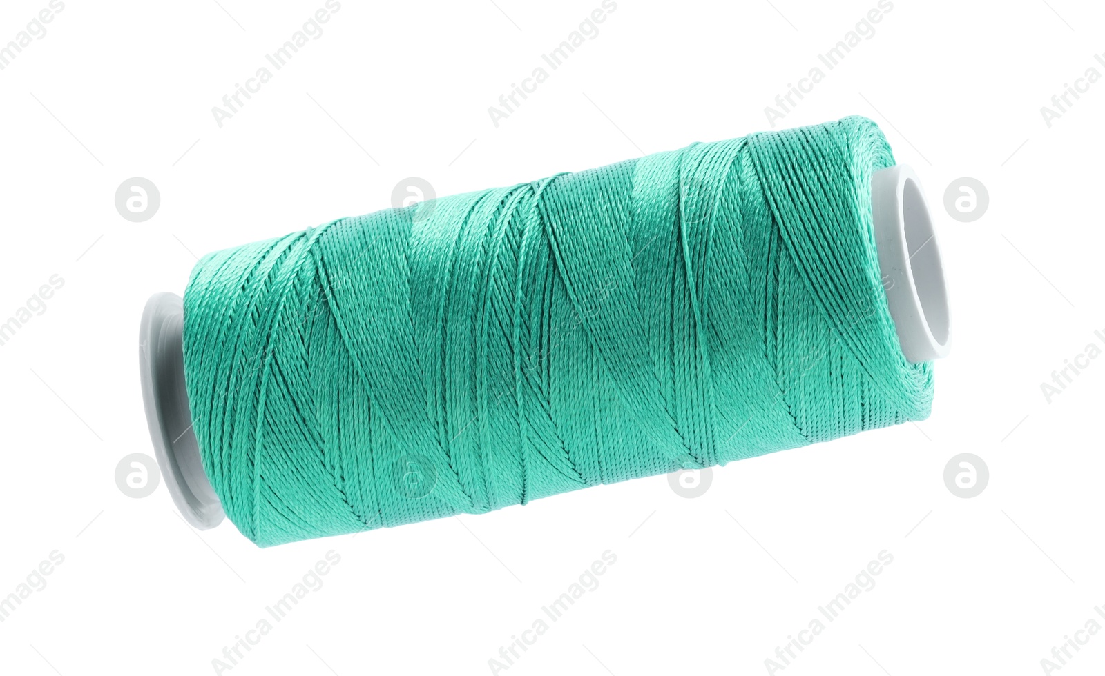 Photo of One spool of sewing thread isolated on white