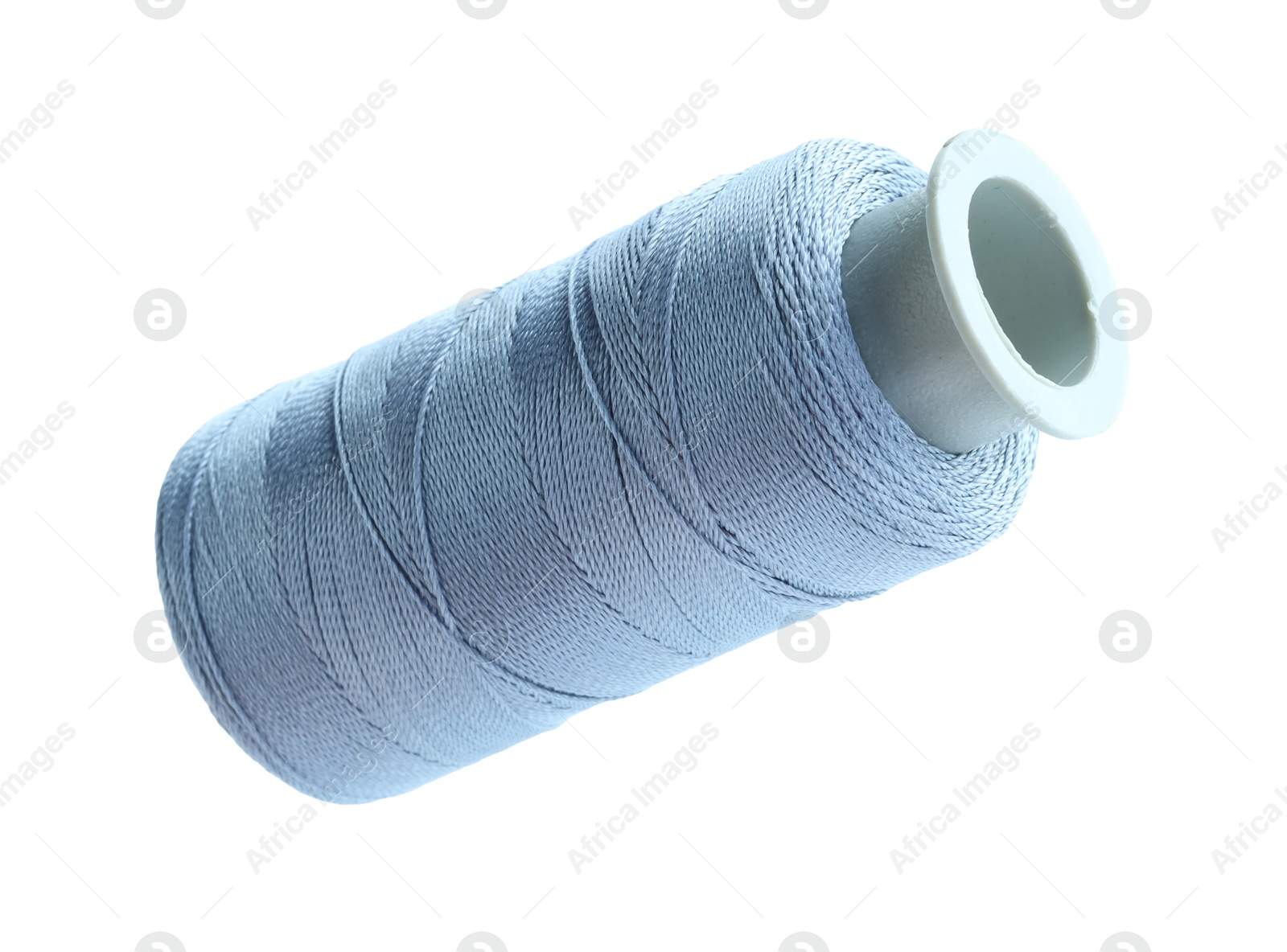 Photo of One spool of sewing thread isolated on white