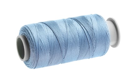 Photo of One spool of sewing thread isolated on white