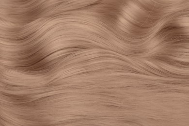 Image of Beautiful hair in mocha mousse shade, closeup. Trendy color of 2025 year