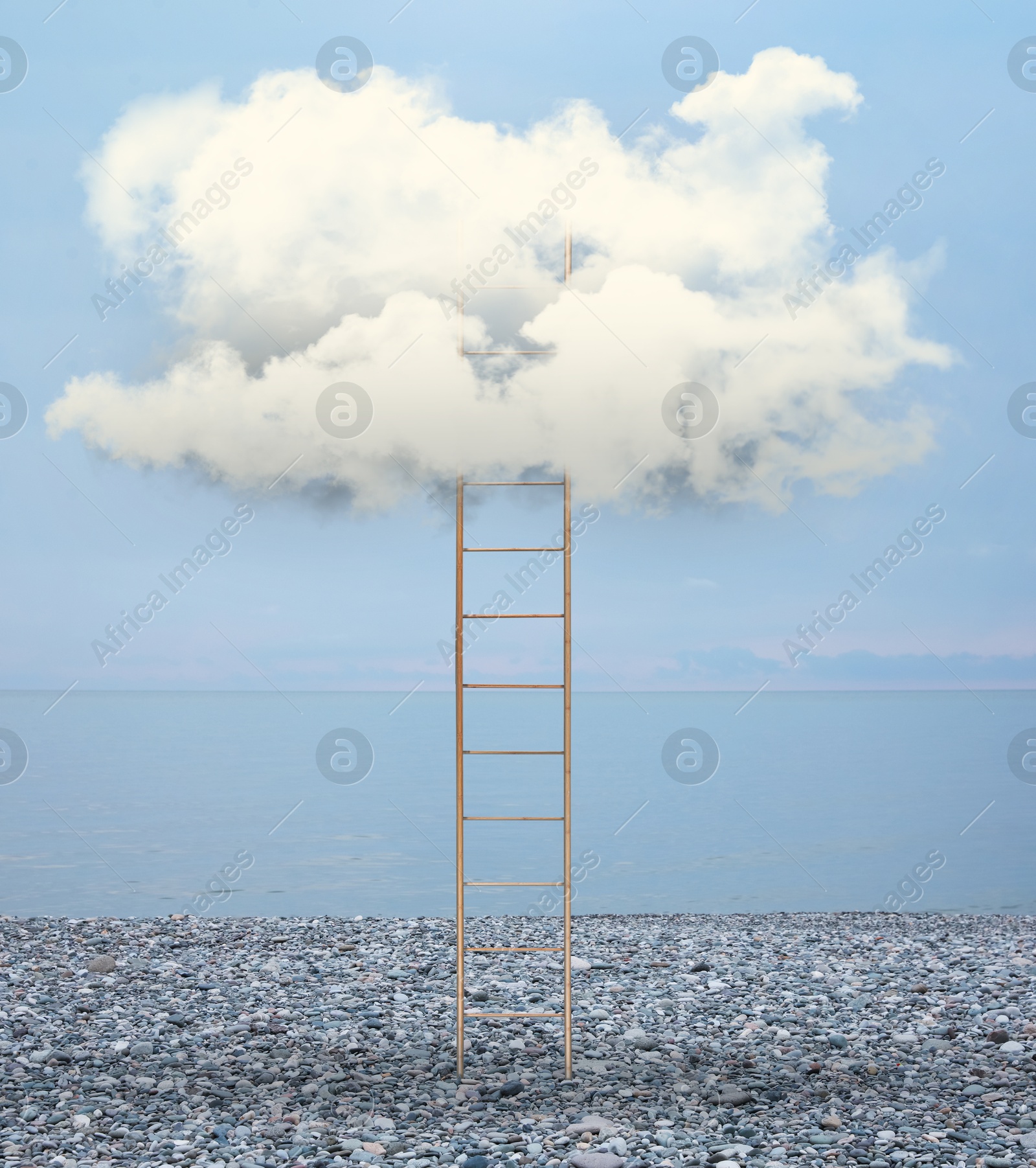 Image of Ladder coming from beach to cloud in sky