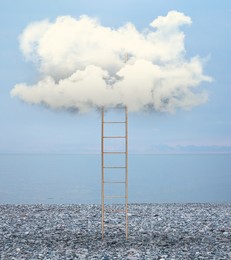 Image of Ladder coming from beach to cloud in sky