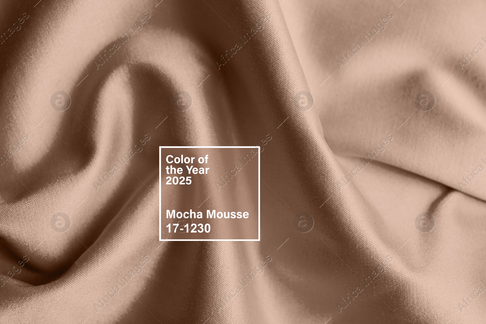 Image of Mocha mousse - color of 2025 year. Silk fabric in brown shade, closeup