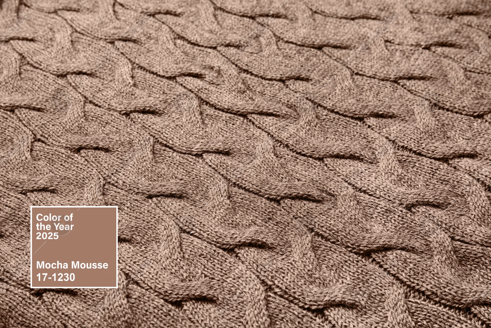 Image of Mocha mousse - color of 2025 year. Knitted fabric in brown shade, closeup