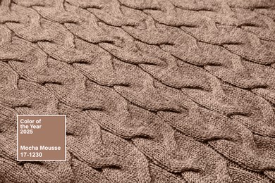 Image of Mocha mousse - color of 2025 year. Knitted fabric in brown shade, closeup