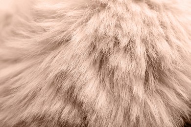 Image of Faux fur in mocha mousse shade, closeup. Trendy color of 2025 year