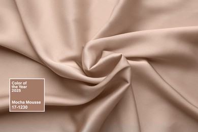 Image of Mocha mousse - color of 2025 year. Silk fabric in brown shade, closeup