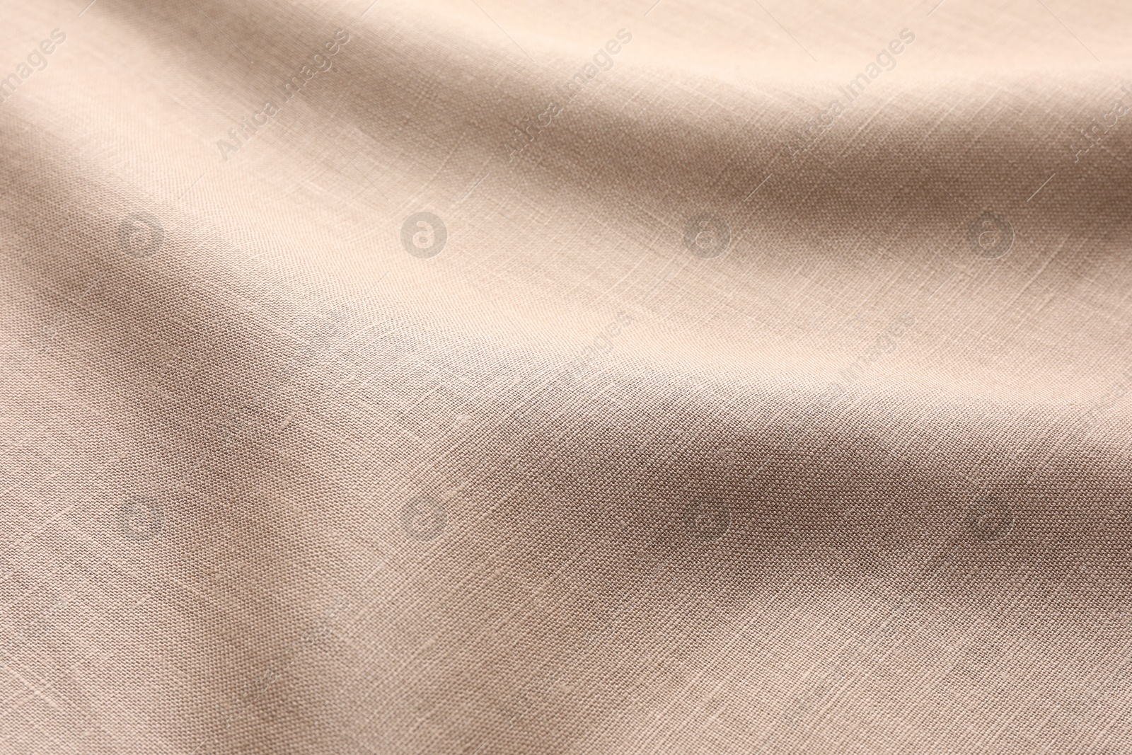 Image of Fabric in mocha mousse shade, closeup. Trendy color of 2025 year