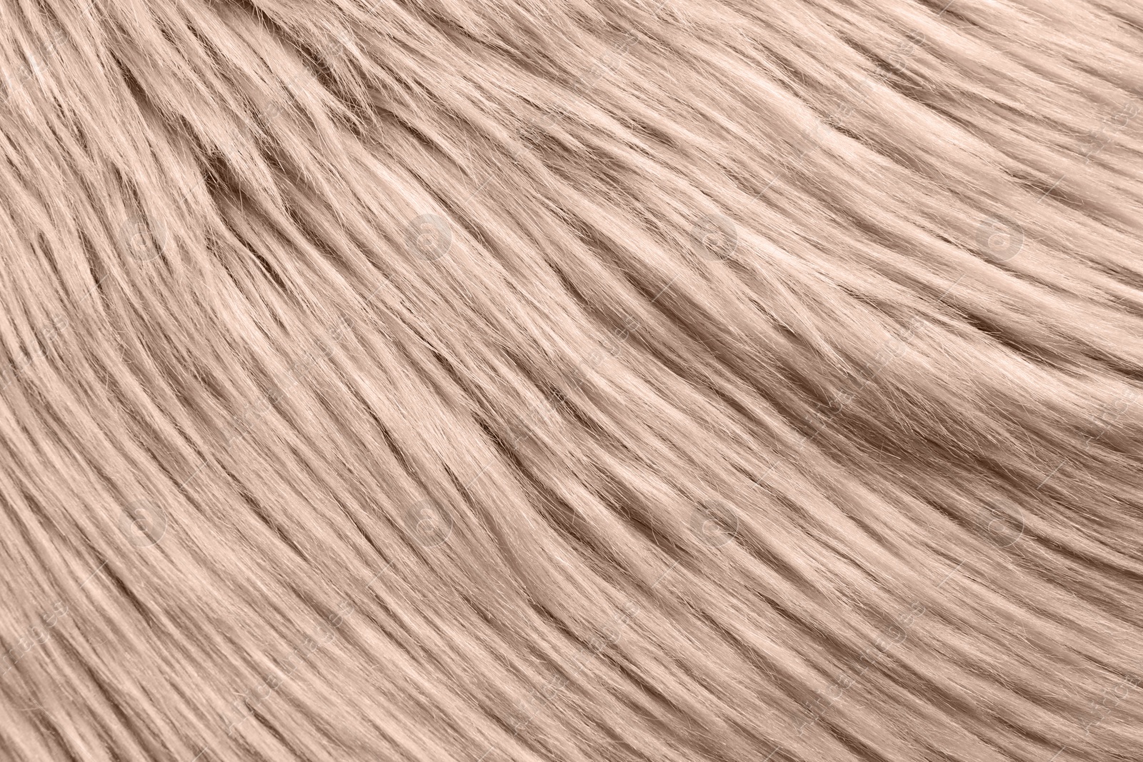 Image of Faux fur in mocha mousse shade, closeup. Trendy color of 2025 year