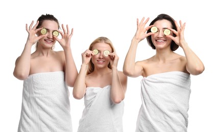 Photo of Spa day. Cheerful women wrapped in towels with cucumber slices on white background