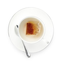 Photo of Tea bag in cup with hot drink isolated on white, top view