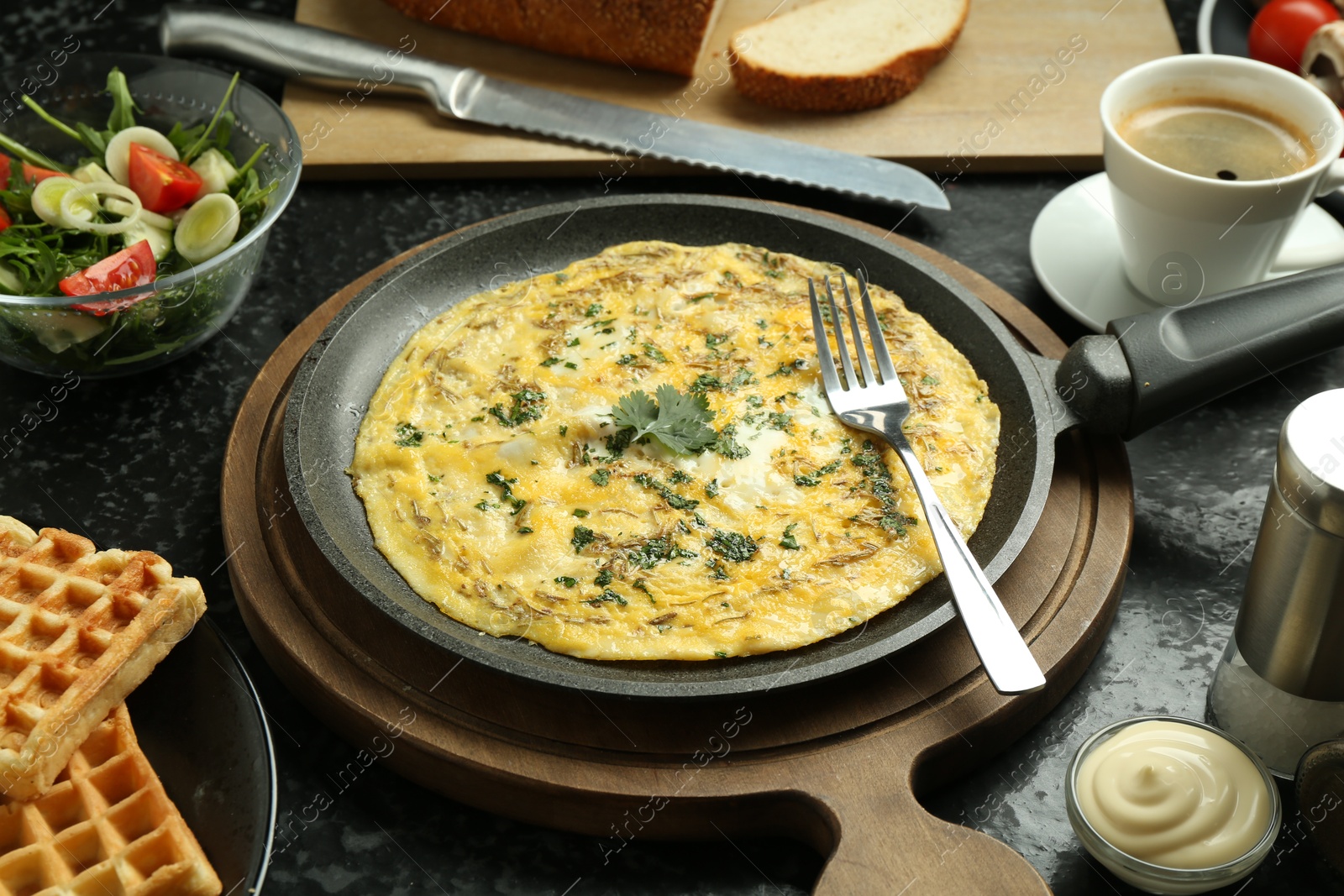 Photo of Tasty food served for brunch on black table