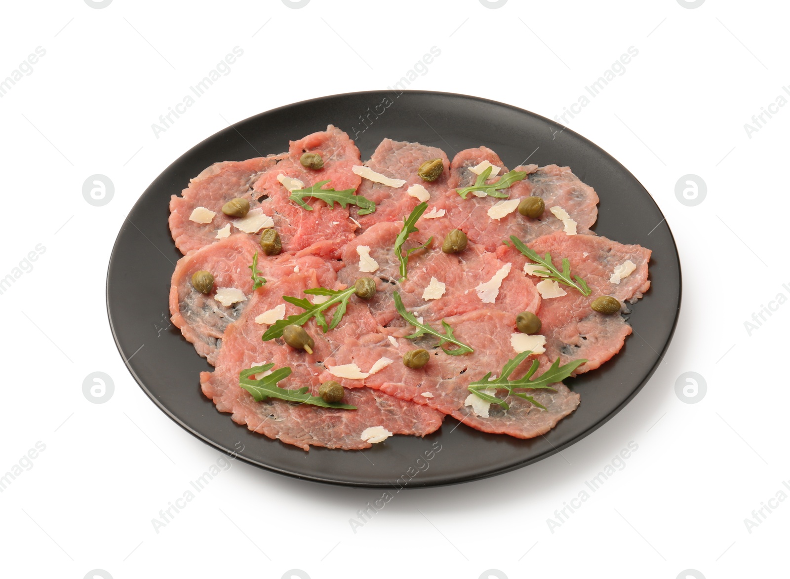 Photo of Delicious beef carpaccio with arugula, capers and cheese isolated on white