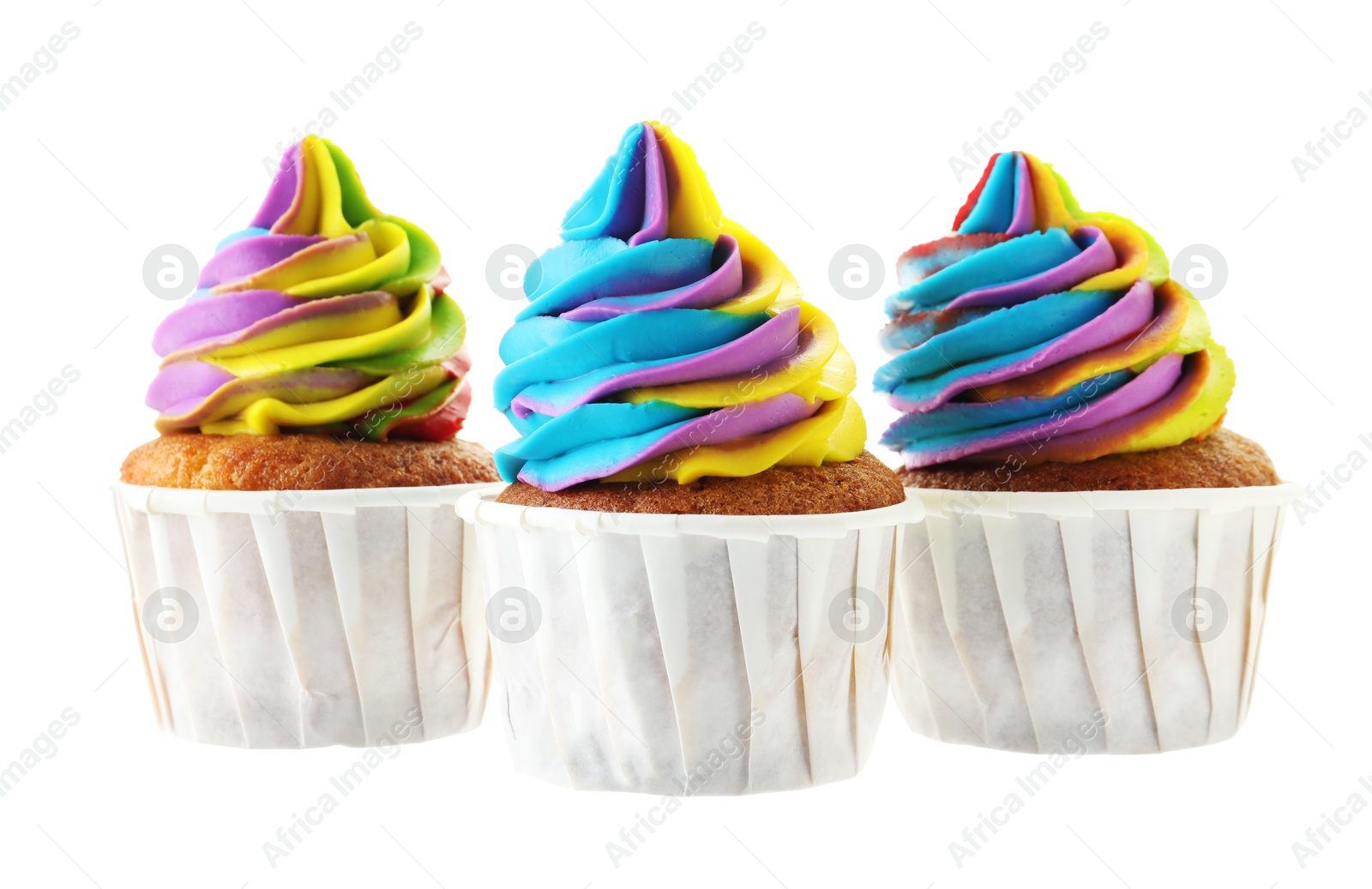 Photo of Tasty cupcakes with colorful cream isolated on white