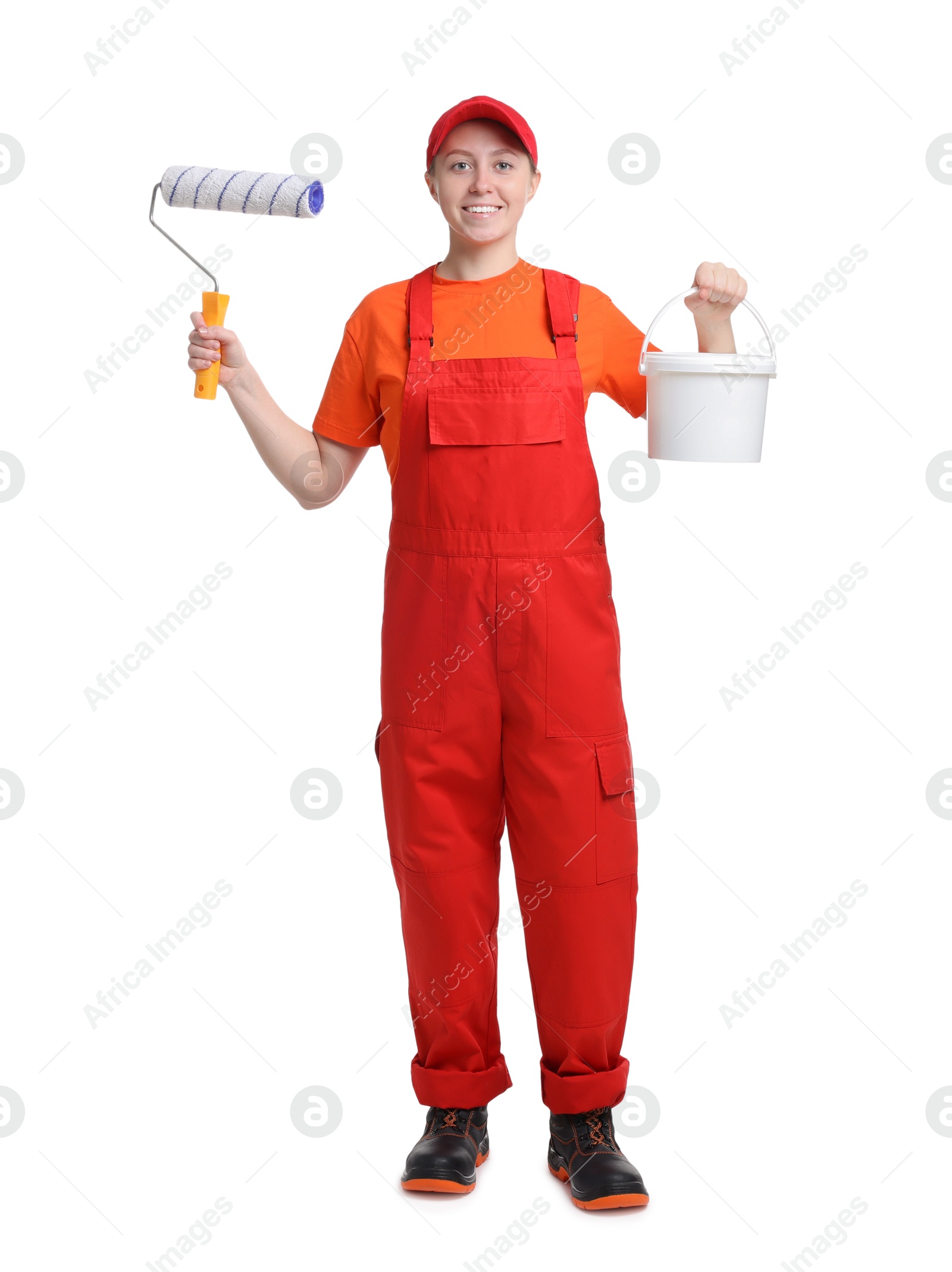 Photo of Professional painter with roller and bucket of paint on white background