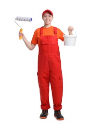 Photo of Professional painter with roller and bucket of paint on white background