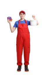 Photo of Professional painter with color samples and bucket of paint on white background