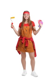 Photo of Woman with paint roller and color samples on white background