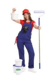 Photo of Professional painter with roller and buckets of paint on white background