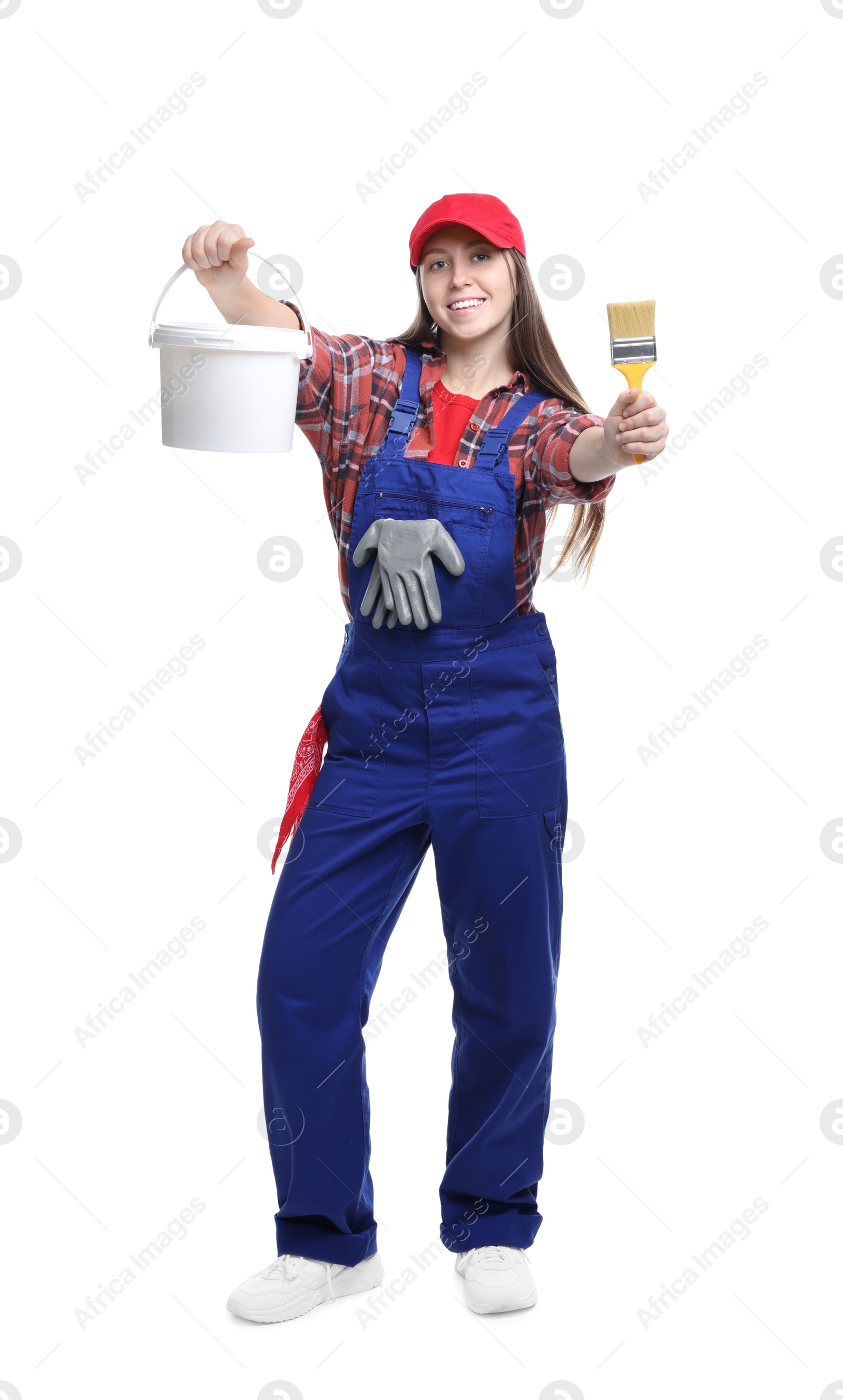 Photo of Professional painter with brush and bucket of paint on white background