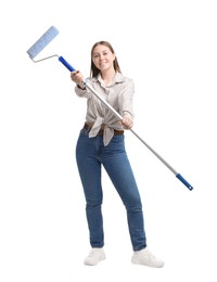 Photo of Woman with paint roller on white background