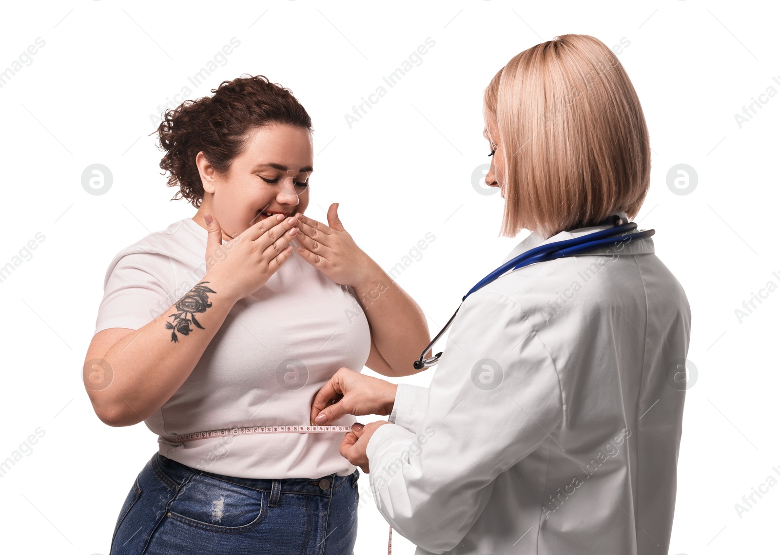 Photo of Weight loss. Nutritionist measuring patient's waist with tape on white background