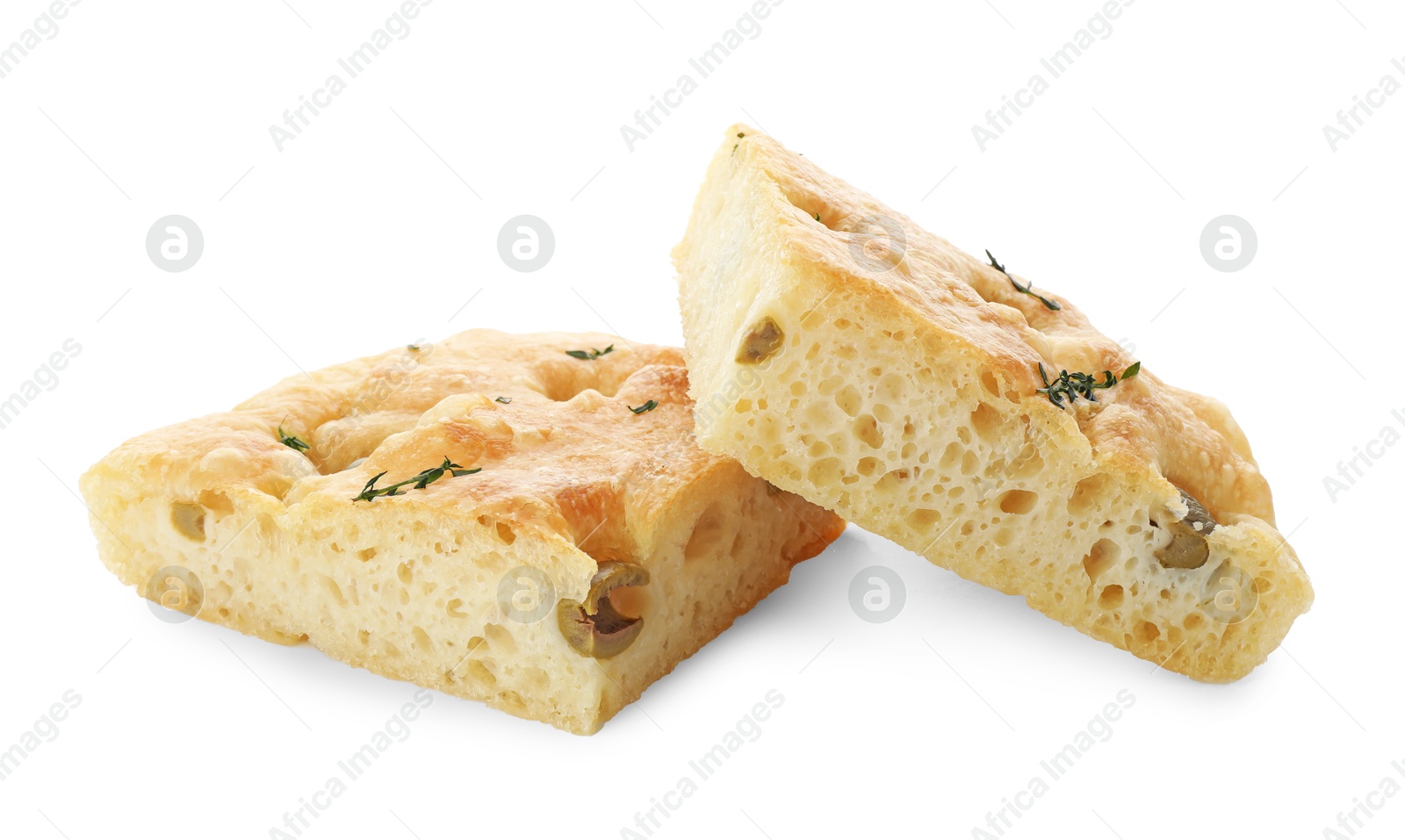 Photo of Pieces of delicious focaccia bread with olives and thyme isolated on white