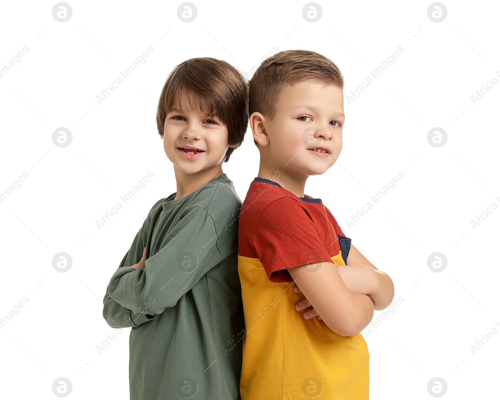 Photo of Portrait of cute brothers on white background