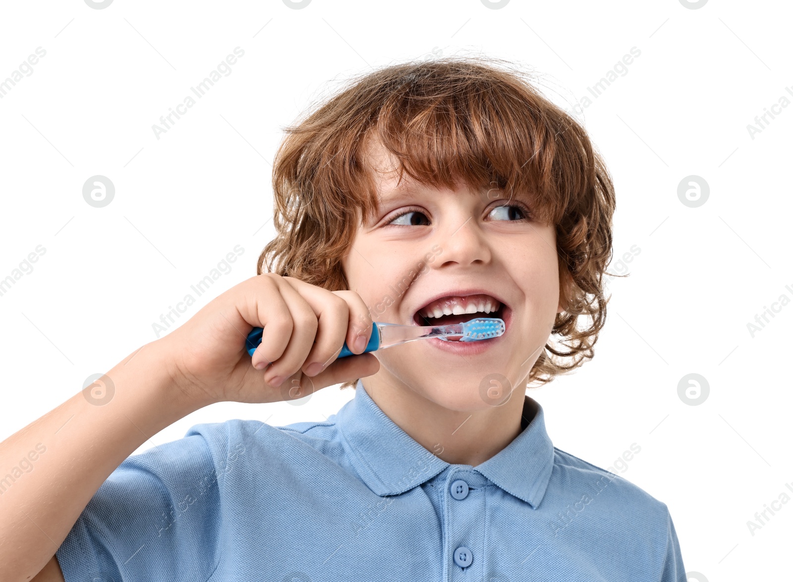 Photo of Cute boy brushing his teeth on white background