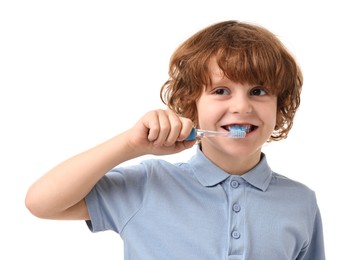 Photo of Cute boy brushing his teeth on white background