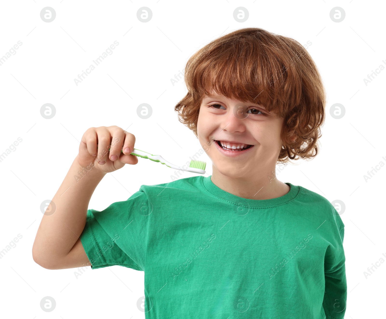 Photo of Cute boy with toothbrush on white background