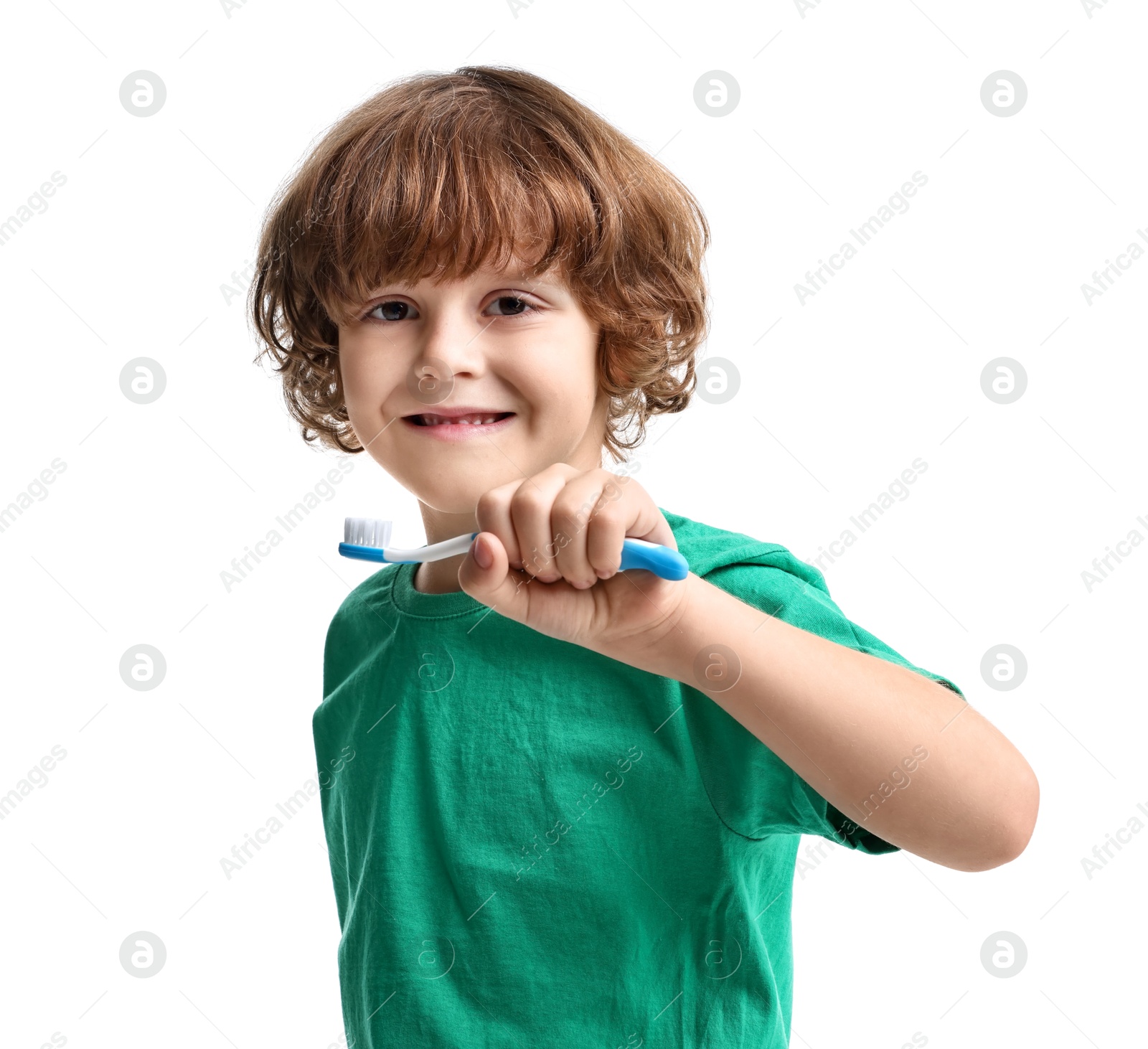 Photo of Cute boy with toothbrush on white background