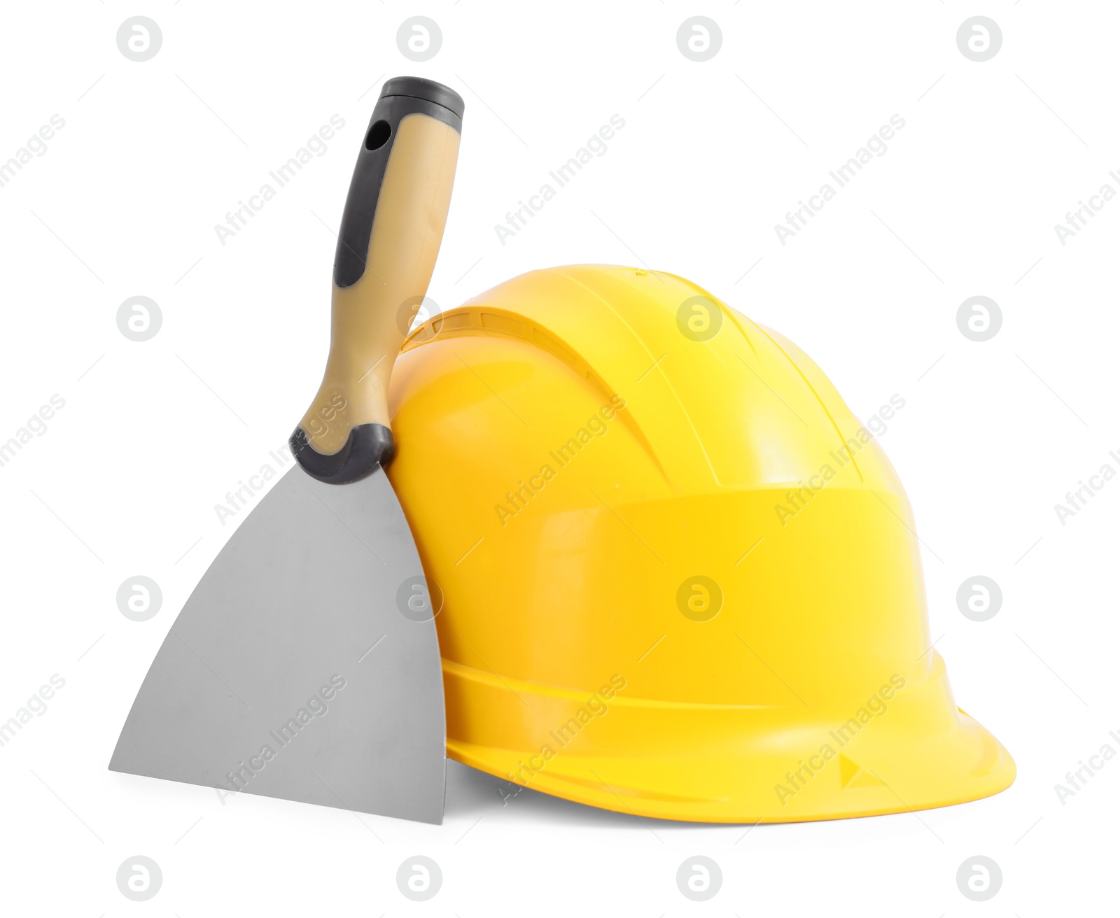 Photo of Hardhat and putty knife isolated on white. Construction tool