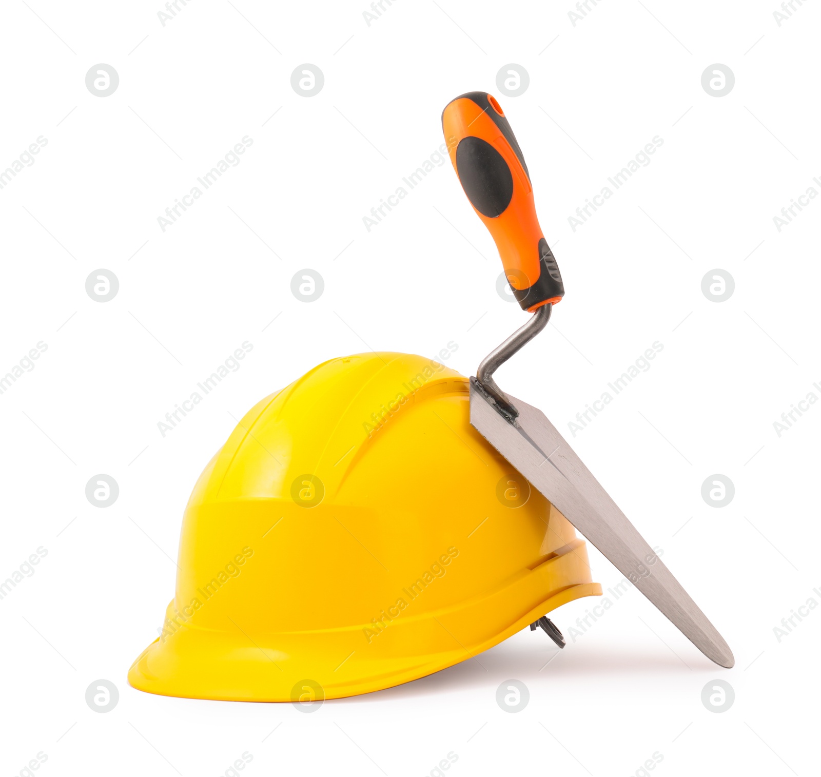 Photo of Hardhat and trowel isolated on white. Construction tool