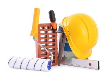 Photo of Building materials, hardhat and construction tools isolated on white