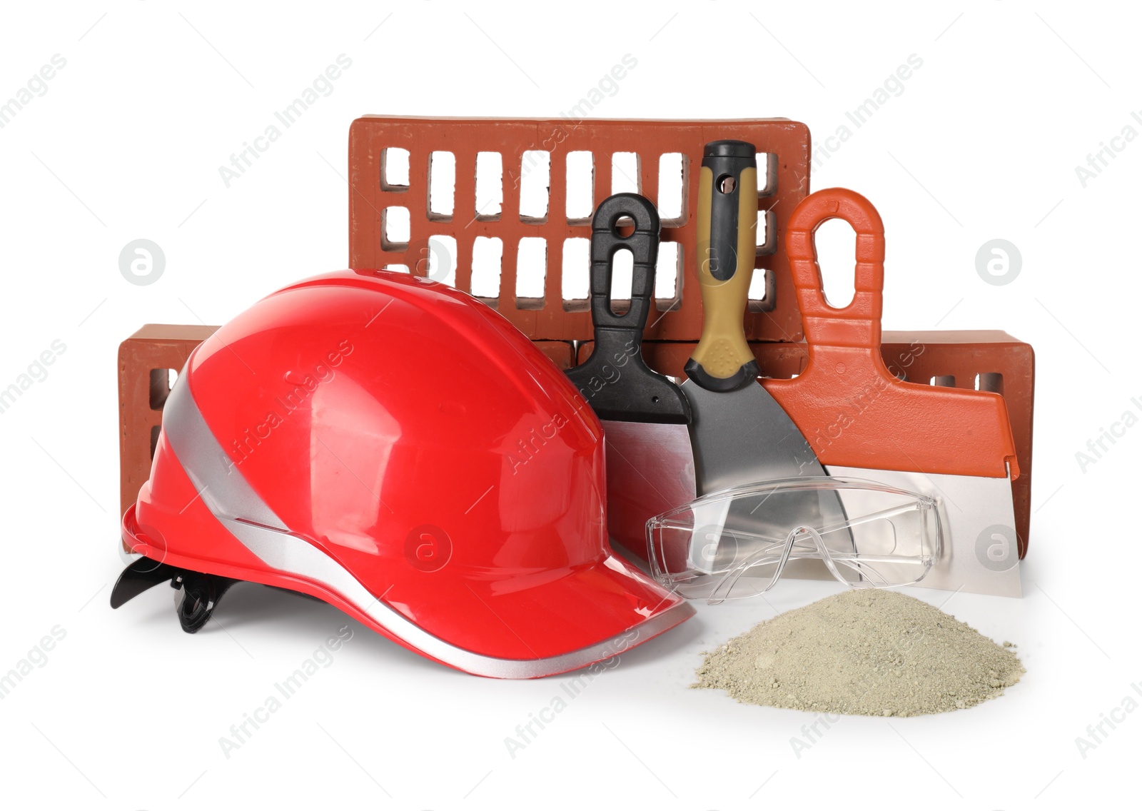 Photo of Building materials, safety equipment and construction tools isolated on white