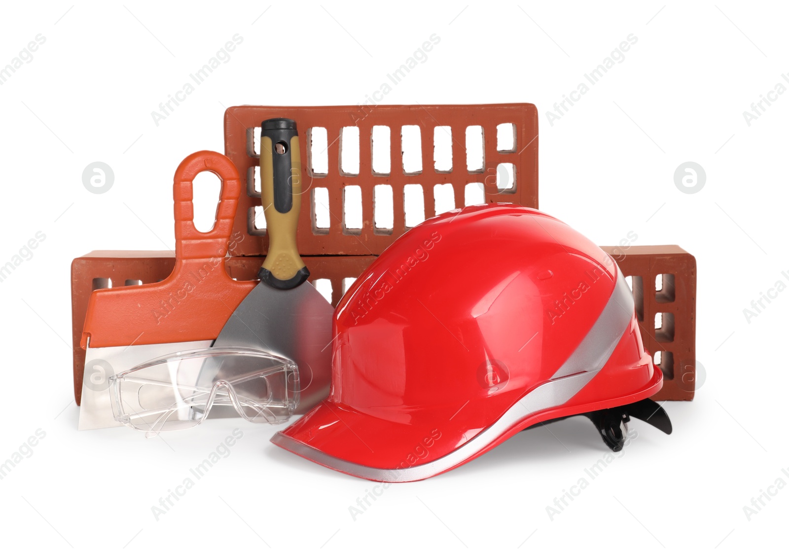 Photo of Building materials, safety equipment and construction tools isolated on white