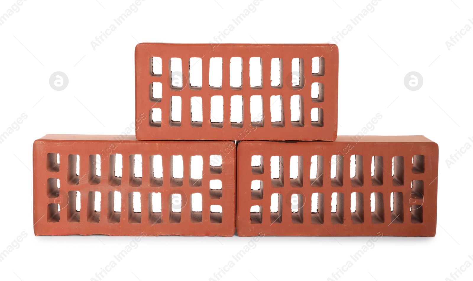 Photo of Red bricks isolated on white. Construction material