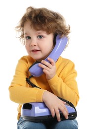 Photo of Cute little boy with telephone on white background