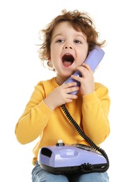 Photo of Cute little boy with telephone on white background