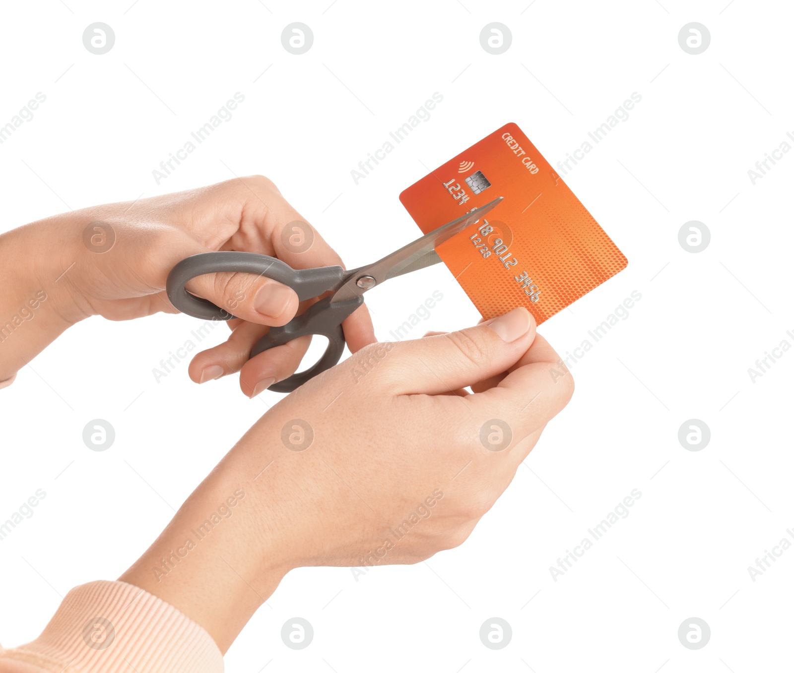 Photo of Woman cutting credit card on white background, closeup