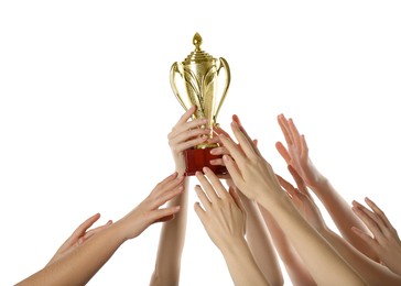 Photo of Group of people with golden trophy up on white background, closeup