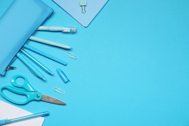 Photo of Different stationery on light blue background, flat lay. Space for text