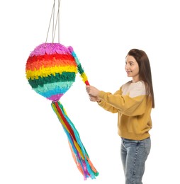 Photo of Happy woman hitting colorful pinata with stick on white background