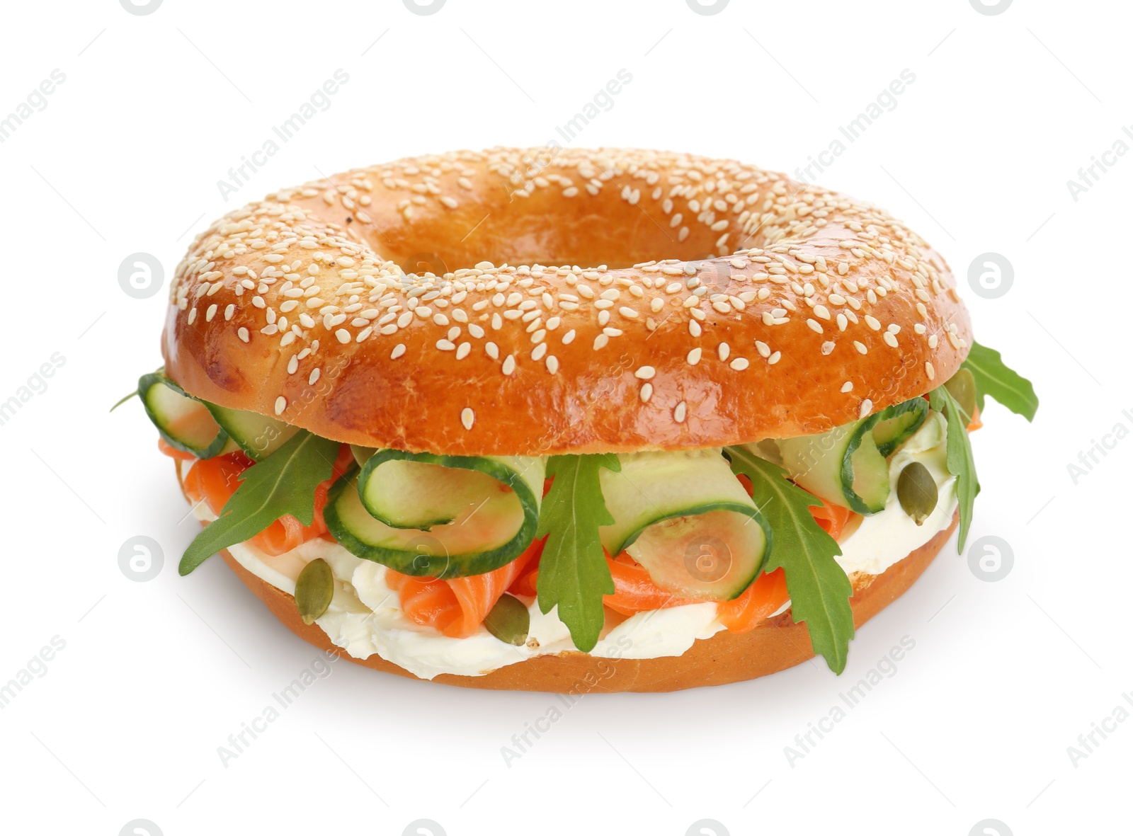 Photo of Delicious bagel with salmon, cream cheese and cucumber isolated on white